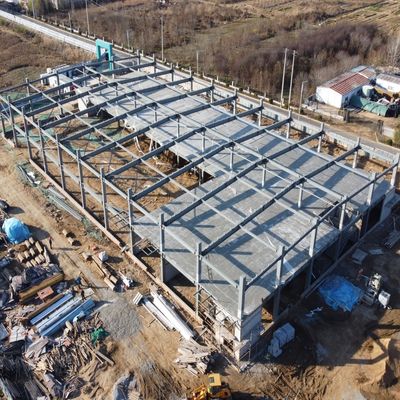 Nhà kho xe thép lắp ghép tùy chỉnh có tầng lửng